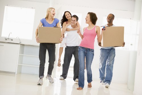 Packed boxes and furniture inside a removal van