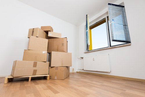 Packed boxes and furniture ready for transport in Chiswick
