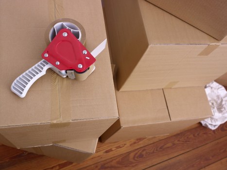 Office furniture and equipment being prepared for a Chiswick commercial move