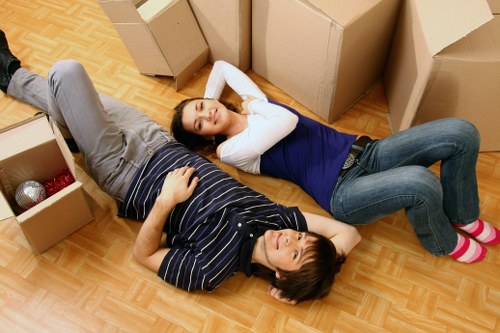 Professional movers loading household items for a Chiswick relocation